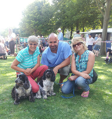 Grove Lodge Vet and Judge Marc Abraham with joint winners of Best Rescue ex-puppy farm breeding spaniels Heidi and Lottie