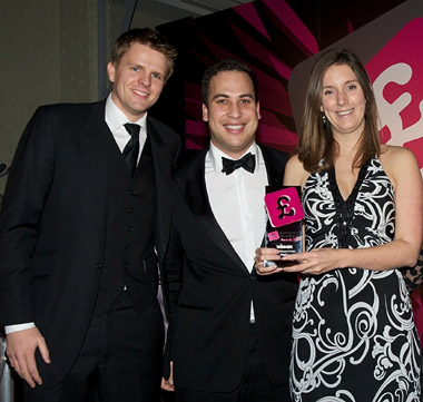 Right to left: Host Jake Humphrey presents the Consumer Moneyfacts award for the UK’s Best Pet Insurance Provider to Carl Stephens and Susanne Murray from Petplan.
