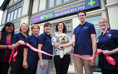 James Cook Vet Partner, with Ashleigh and Pudsey and his new surgery team and his support centre colleagues