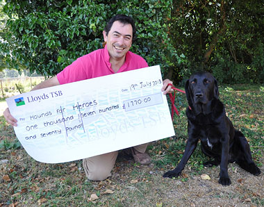 Huw & Hounds for heroes cheque