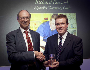 Chris Laurence presenting Richard Edwards with his award