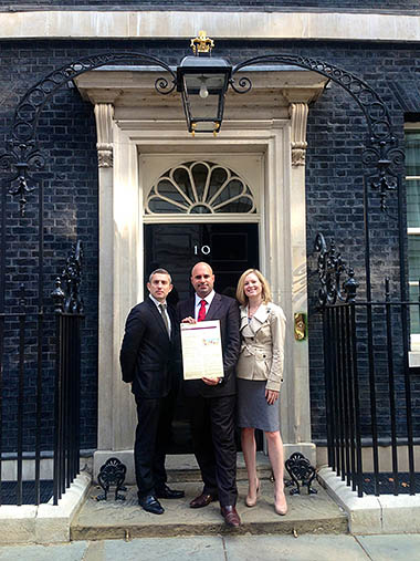 Stuart, Marc and Rebecca standing in front of No. 10