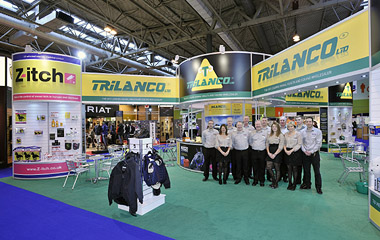 Trilanco team standing in front of their trade stand