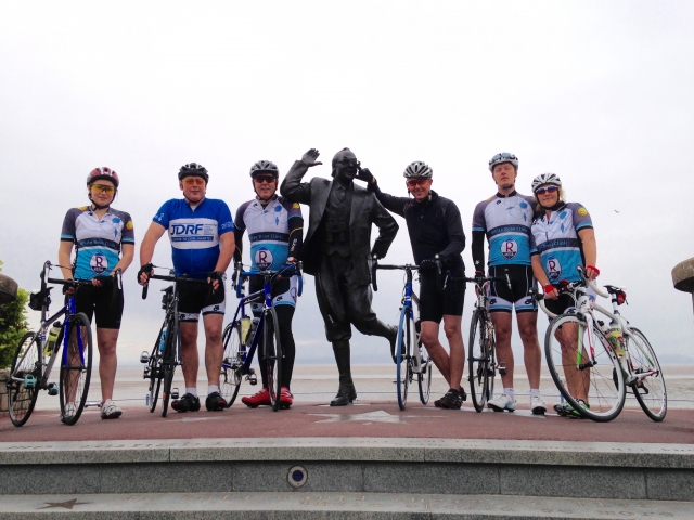 Andrew (second from left) with his team mates  - and Eric Morecambe - at the start of the ride