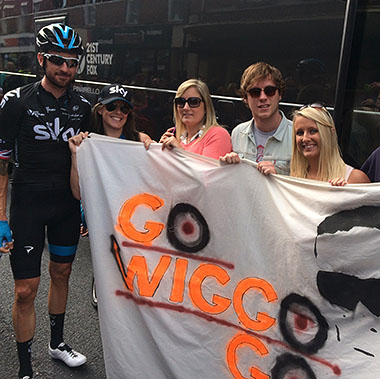 Wiggo with friends and banner