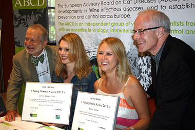 ABCD & Merial Young Scientist Award winners Céline Robert-Tissot and Bianca Stützer flanked by professor Marian Horzinek (ABCD), at left and Jean-Christophe Thibault (Merial).