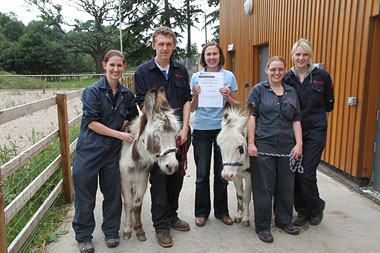 Claire Powell (centre) with her team of Animal Care technicians outside the barn at Solihull College