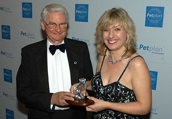 Claire Bessant receiving her Blue Cross Welfare Award from Dr Andrew Edney