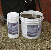 Photo of food tubs on hay