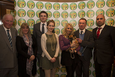 (L-R): Roger Mugford (Animal Behaviourist), Sam Wood (Receptionist), Will Geyelin (Nurse), Charlie Russell (Nurse), Laura Hamilton (TV presenter), Andrew Ash (Owner, Grove Lodge Vets), Marc Abraham (Vet)
