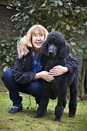 Helen Stone with pet poodle, George