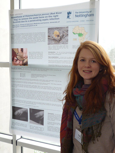 Alice in front of her poster