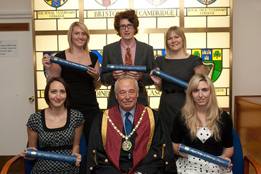 Students from St George's University, Grenada, attend a ceremony at the Royal College of Veterinary Surgeons, London, and are admitted to the college. L-R: Francesca Hendey, Matthew Foulkes, Jennifer Roberts. Front: Caroline Dennis, college president Dr Jerry Davies, Ashley Beresford. Wednesday 27/7/2011. Photograph © Andrew McCargow