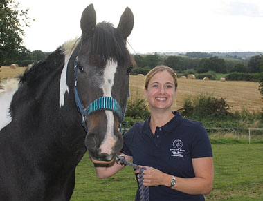 Photo of Helen with a horse