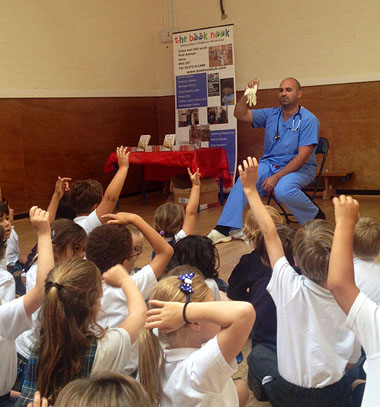 Grove Lodge Vet Marc Abraham giving one of his weekly school visits about caring for animals