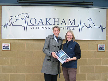 Pictured is Liz Barrett, equine specialist representative at Boehringer Ingelheim, presenting Francesca Hawkins from Oakham Veterinary Hospital with her iPad
