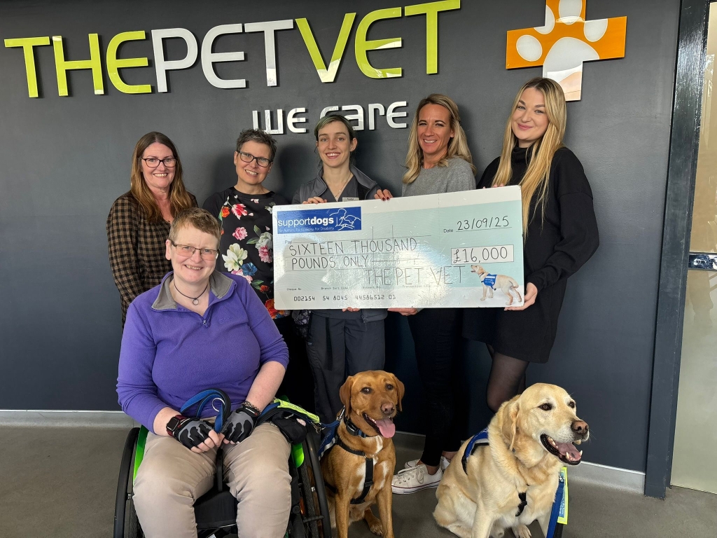 Colleagues at The Pet Vet presenting their £16,000 cheque to Support Dogs