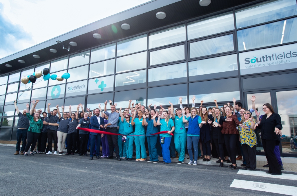Left, Daniel Hogan, hospital director, and clinical director Henry L&#39;Eplattenier cut the ribbon with the rest of the team at Southfields Veterinary Specialists’s new £16 million Basildon site 