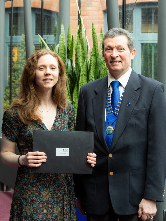 Johanna Forsythe being presented with her Masters by BSAVA outgoing President Philip Lhermette. Please credit Paul Clarke Photography