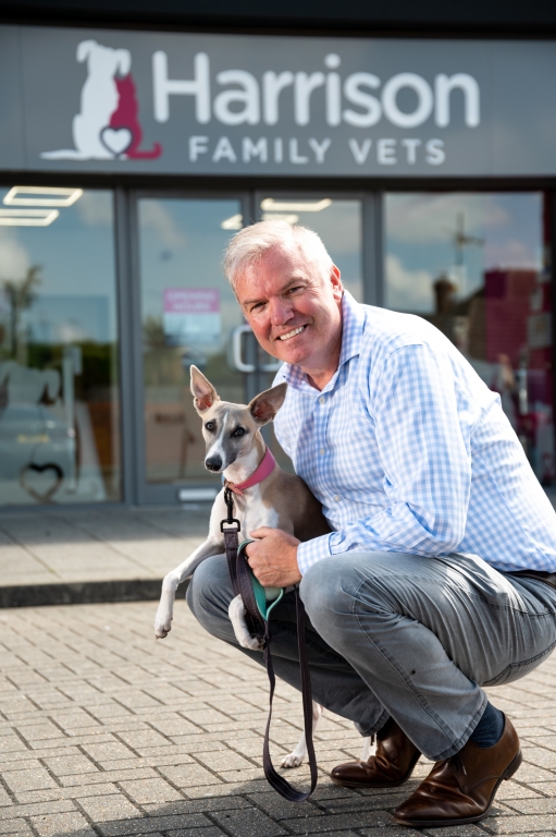 Managing Director of Harrison Family Vets, Tim Harrison with his 8 month old Whippet, Katie