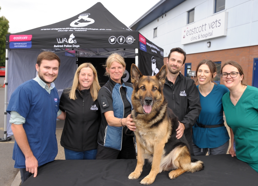 From left to right, Eastcott’s Robert Weeks; Claire Todd, trustee and treasurer at WAGS; Cindy Hargreves with retired police dog Tyke; Adam Weal from WAGS; Nicola Scott and Louise Fowden from Eastcott Veterinary Referrals 