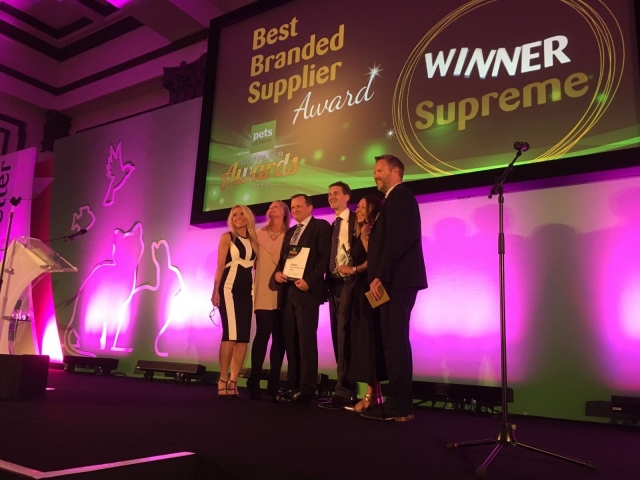 Chris Childs, Claire Hamblion and Nick Thomas receiving their award from Peter Pritchard, Pets At Home Retail CEO, and Category Manager, Jo Derbyshire