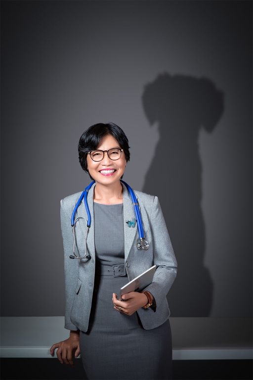 Photo of Dr Siraya Chunekamrai with her shadow as a dog's shadow