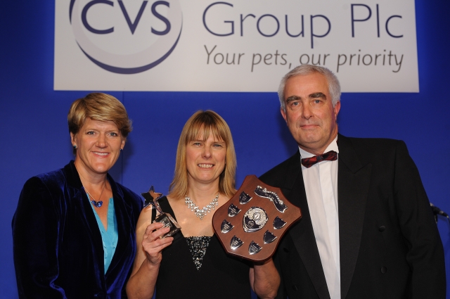 Angela Nicholls receiving her Award from (left) Clare Balding and (right) Simon Innes