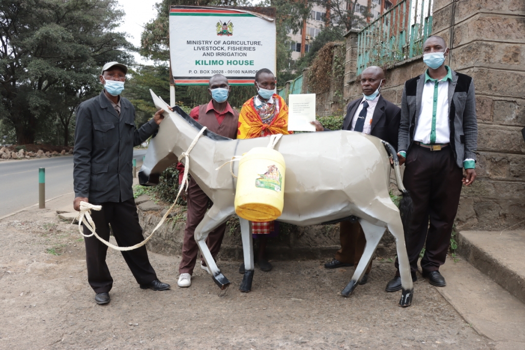 Donkey owners from ADWOK hand in a petition to Government to ask for a fresh ban on the donkey skin trade