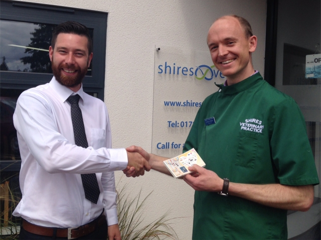From left to right - Sam White, Territory Sales Manager presents Charlie Forman of Shires Vets in Stone, Staffordshire, with his prize