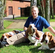 James Oliver with Monty, left, the first Basset Hound discovered with POAG, owned by Su Jones, Basset Hound owner and breeder.