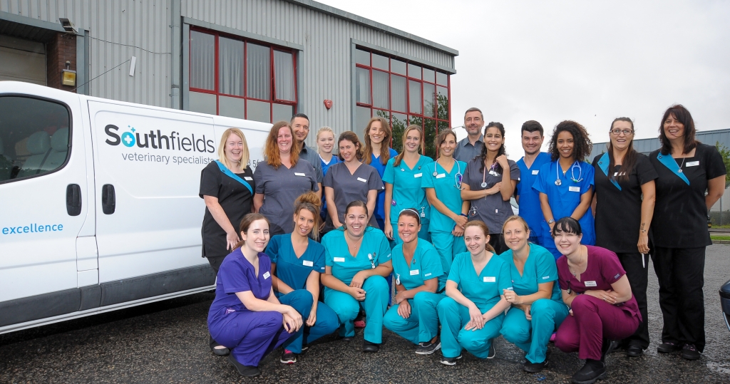 Staff outside Southfields Veterinary Specialists, in Essex, which has undergone a major rebrand