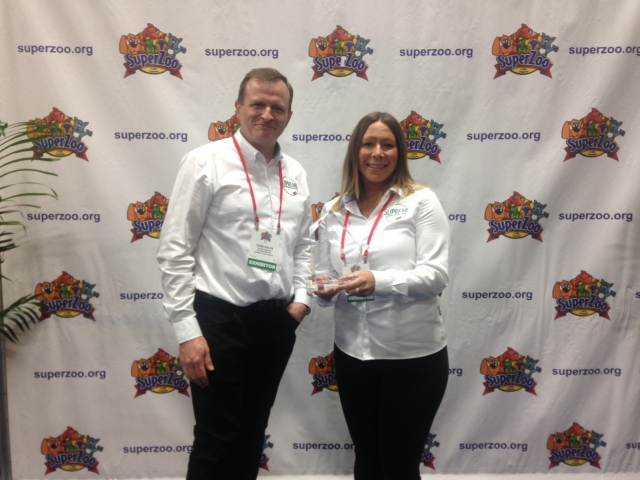 Supreme's Managing Director Chris Childs and Marketing Manager Claire Hamblion receive the award