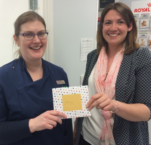 Emily receiving her voucher from Dechras Territory Sales Manager, Sarah Halfhide