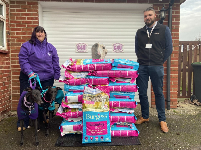 Debbie Buxcey, founder of Greyhounds 4U, one of the winning rescues to receive a donation from Burgess Pet Care, with Sean Deere – National Account Manager for Burgess