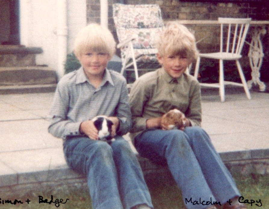 Malcolm Morley with his guinea pigs and brother