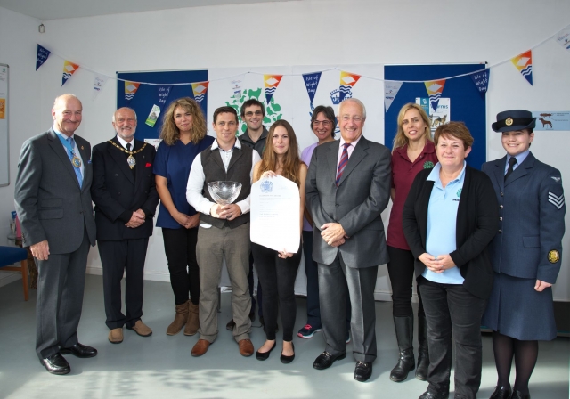 Left to right: Isle of Wight High Sheriff Robin Courage MBE, Isle of Wight Council Chairman Cllr Charles Chapman, Pippa Brown Vet nursereceptionist, Dr Dan Forster Director, Dr John Knight veterinary surgeon, Kirsty Forster co-founderveterinary nurse, Cat