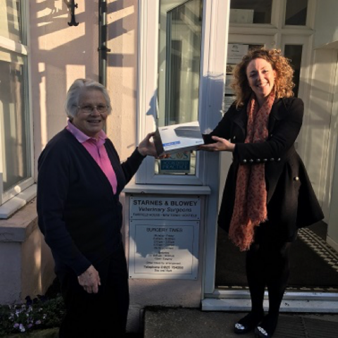 Macahl Animal Health Sales Manager, Lucy Millett presenting Joan with her prize of a Bose Speaker 