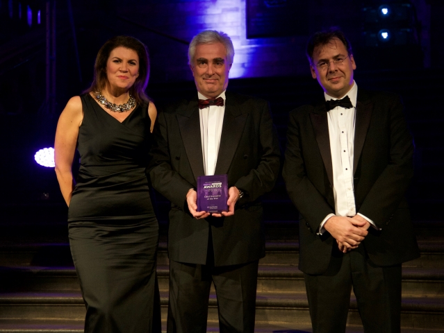 Simon Innes (centre) receiving his Award from Awards Evening Host Julia Hartley Brewer and Philip Secrett, Corporate Finance Partner, Grant Thornton