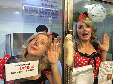 Chantelle and Cat dressed up as cats in polka dot outfits