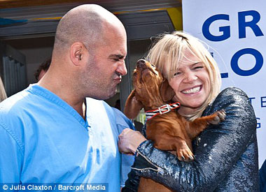 Zoe Ball and TV vet Marc Abraham with Morgan the dachshund at the opening of the new Grove Lodge Vets Southwick (credit Julia Claxton)